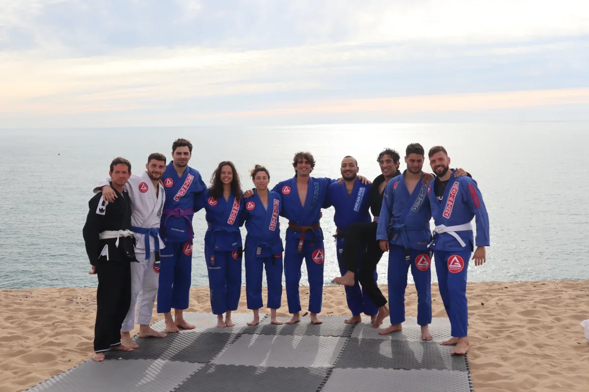 MatnWave participants standing together in gis beside the ocean