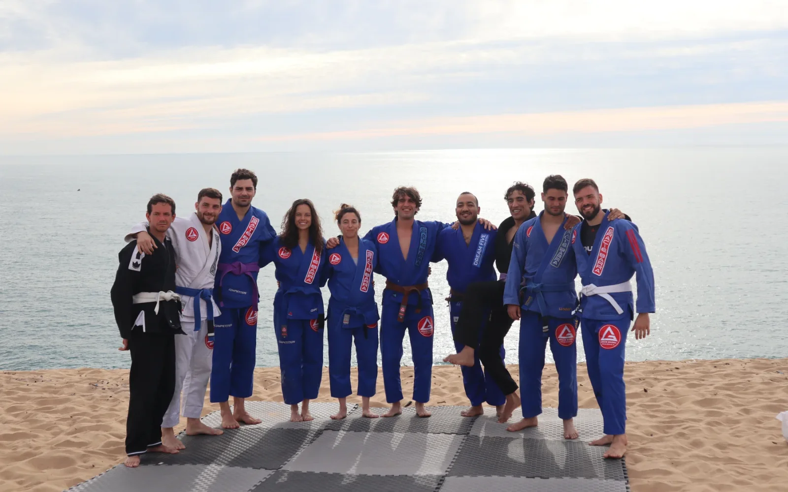 MatnWave participants standing together in gis beside the ocean — previous MatnWave edition